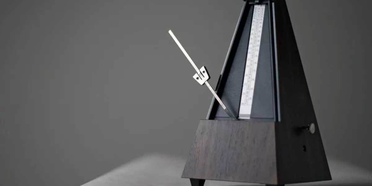 A wooden traditional metronome